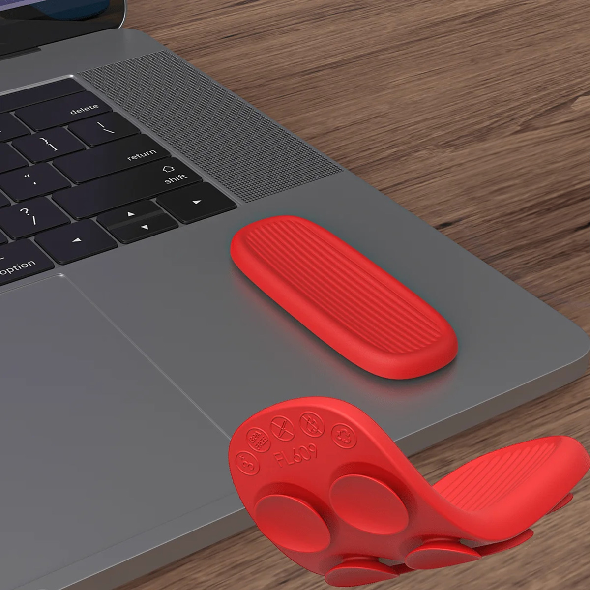 Kamyczek sensoryczny zamocowany na laptopie
